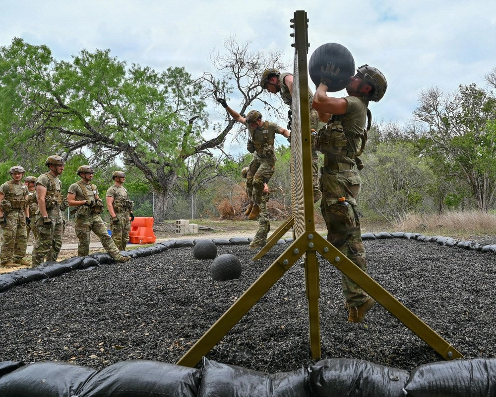 Air Force Special Warfare candidates complete an obstacle course during Assessment and Selection at Joint Base San Antonio-Lackland, Texas, April 16, 2026. U.S. Air Force photo by Ava Leone.