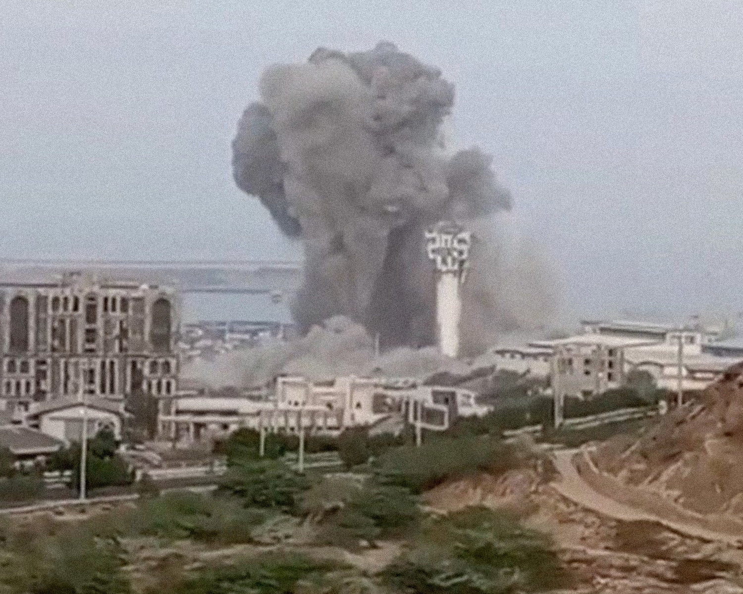 Iran, US step up attacks, though release of American may signal path to climbdown
