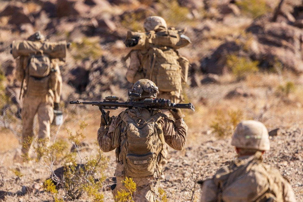 Illustrative file photo — Reserve Marines with 1st Battalion, 24th Marine Regiment move to firing positions during live-fire training at Twentynine Palms, California, June 7, 2026. U.S. Marine Corps photo by Cpl. Van Hoang