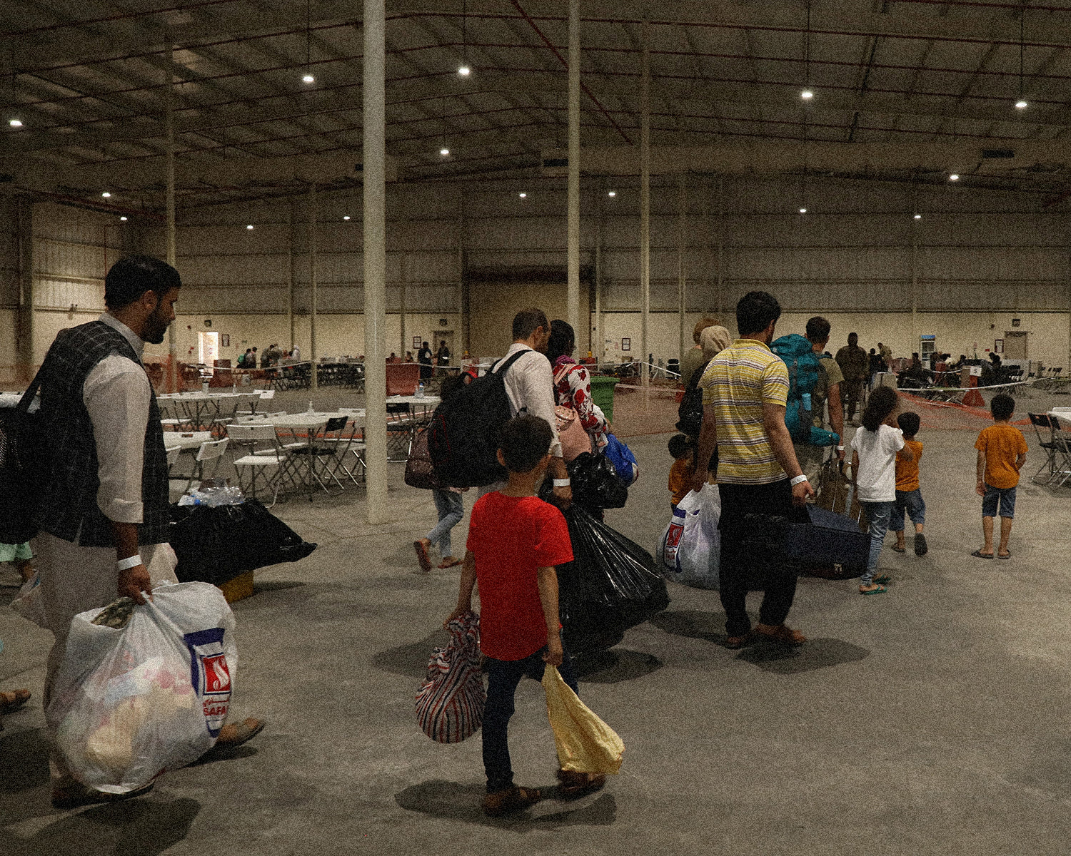 US pays Afghans stranded in Qatar to repatriate, plan labeled “betrayal”