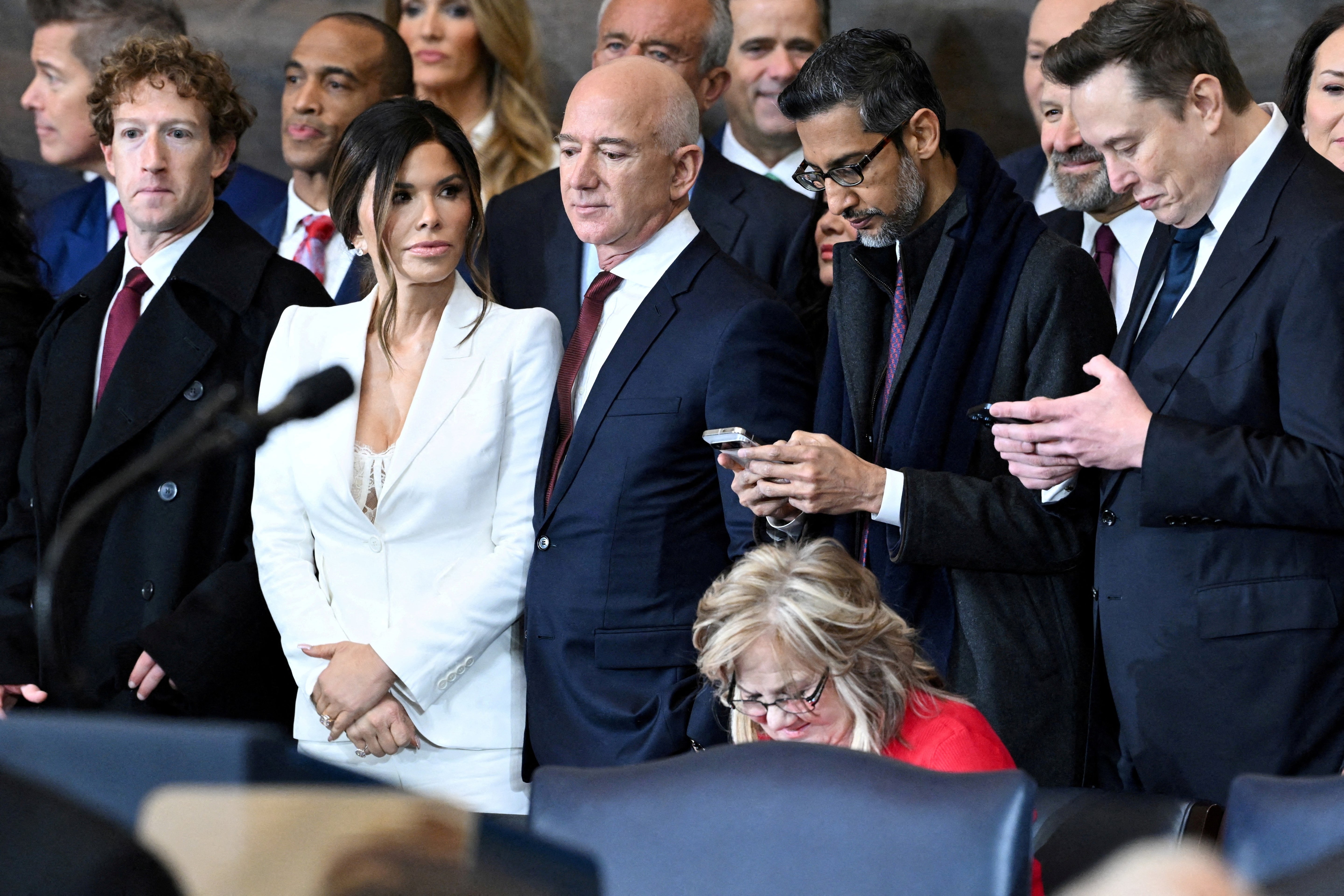 FILE PHOTO: CEO of Meta and Facebook Mark Zuckerberg, Lauren Sanchez, Amazon founder Jeff Bezos, Google CEO Sundar Pichai and Tesla and SpaceX CEO Elon Musk attend the inauguration ceremony before Donald Trump is sworn in as the 47th US President in the