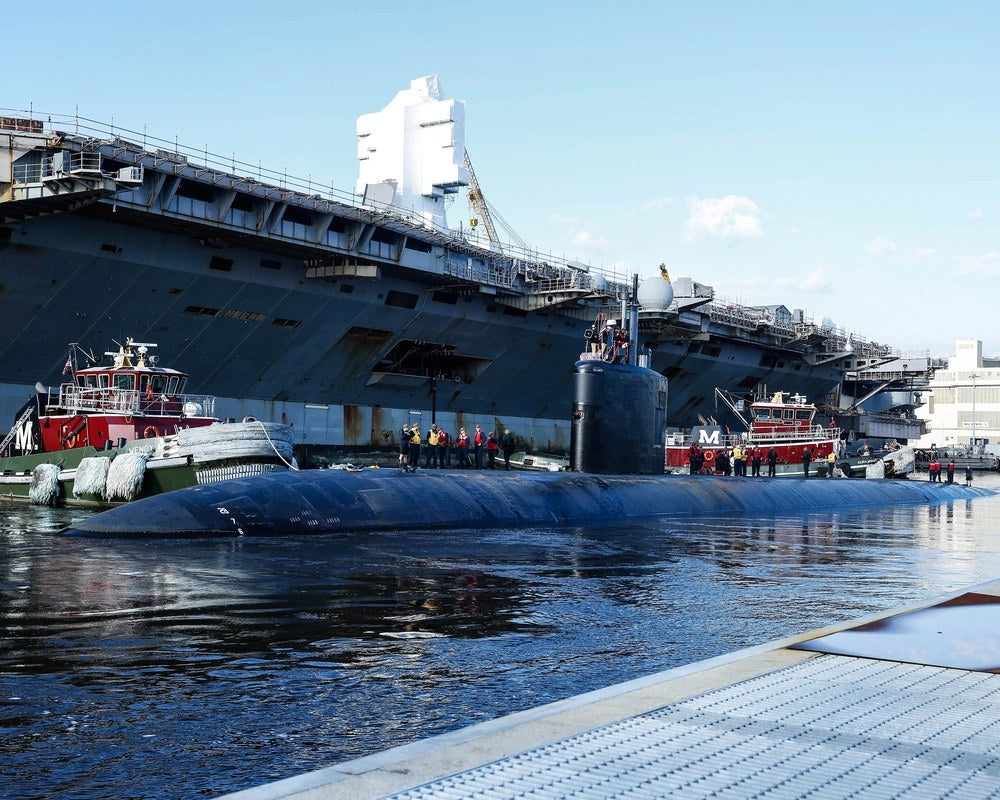 The Los Angeles-class attack submarine USS Pasadena transits Norfolk Naval Shipyard in Portsmouth, Virginia, in October 2021. A new GAO report found Navy attack submarines lost more than 15,000 operational days to maintenance delays and idle time from