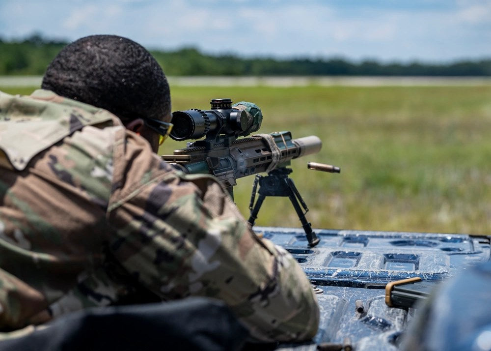 Chief Master Sgt. Harold Davis fires a suppressed M110A1 squad designated marksman rifle at Moody Air Force Base, Georgia, July 12, 2024.

Credit: U.S. Air Force photo by Airman 1st Class Leonid Soubbotine