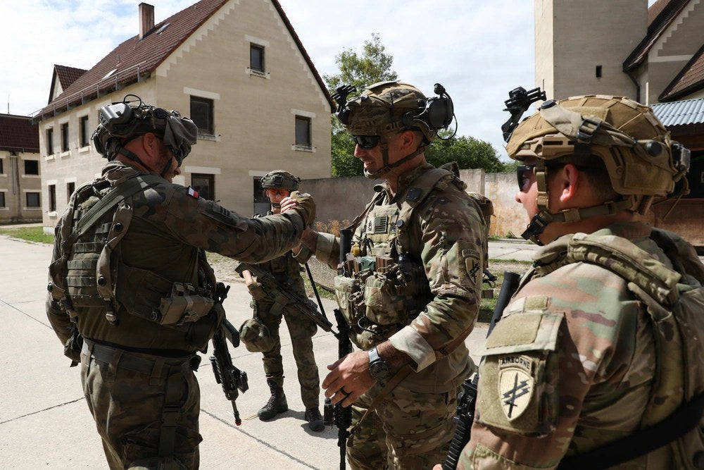 Soldiers with the 173rd Mobile Brigade Combat Team (Airborne) and the Polish Territorial Defense Force provide security for a brigade command post during Saber Junction 26 at Hohenfels Training Area, Germany, Aug. 30, 2026. (U.S. Army photo by Staff Sgt.