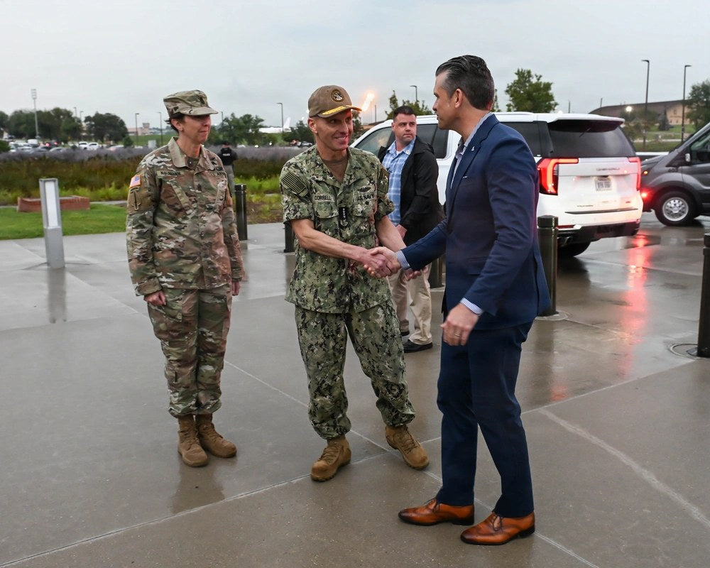Secretary of War Pete Hegseth meets with Adm. Rich Correll, commander of U.S. Strategic Command, at Offutt Air Force Base, Nebraska, on Aug. 24, 2026. The Pentagon is moving to reduce the number of general and admiral billets across the military. U.S.