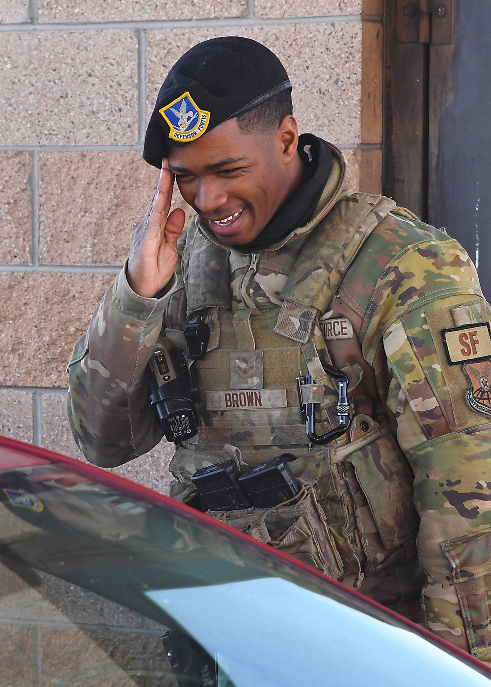 Airman 1st Class Derek Brown of the 377th Security Forces Squadron works an entry gate at Kirtland Air Force Base, New Mexico, in February 2023. Kirtland says it has no plans to restrict common religious greetings at its gates. (U.S. Air Force photo by