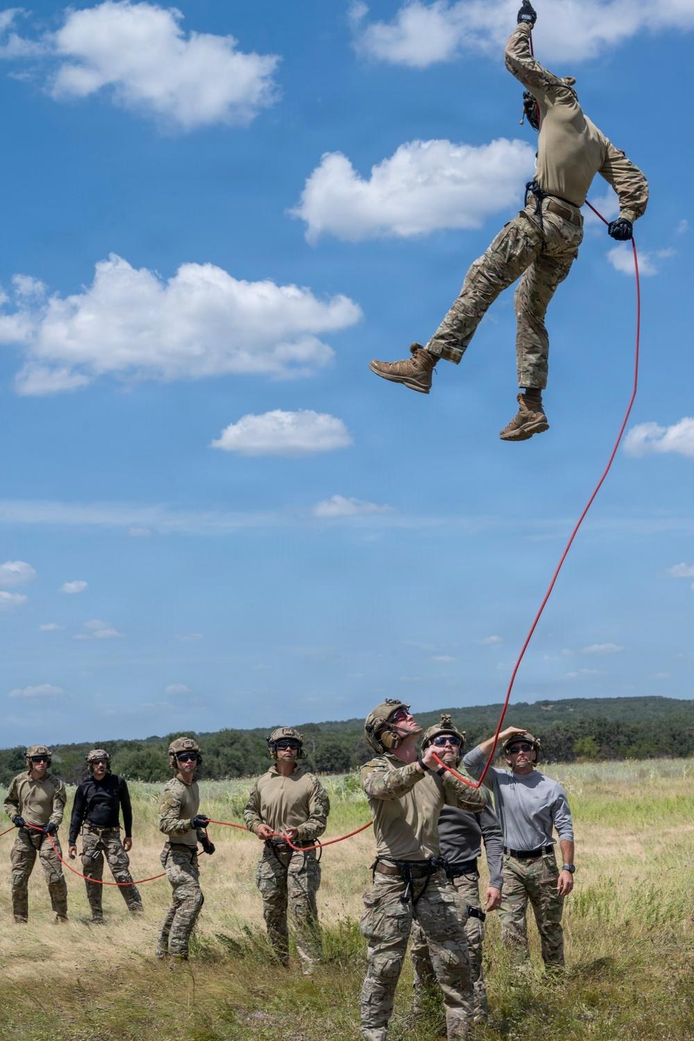 A U.S. Air Force TACP Airman assigned to the 6th Combat Training Squadron, Detachment 2, conducts rappelling training at Joint Base San Antonio-Camp Bullis on Aug. 19, 2026. Tech. Sgt. Ian Patterson, an instructor with the same unit, was killed in a