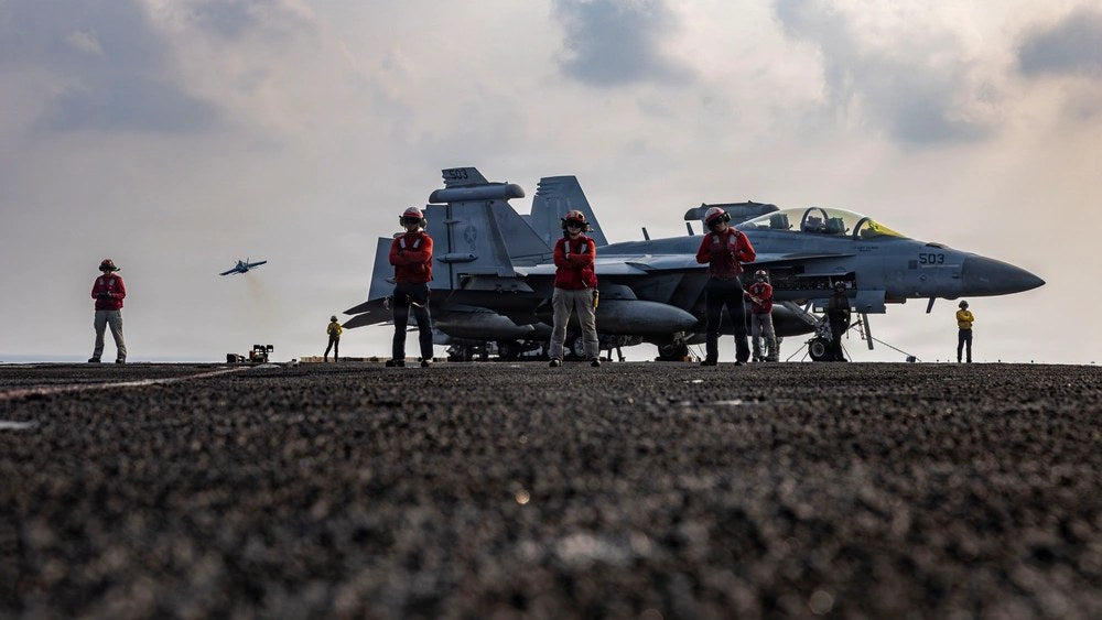 U.S. Sailors conduct flight operations aboard USS Abraham Lincoln in the Gulf of Thailand on Sept. 8, 2026. The photo was taken during the carrier's extended 2025 to 2026 deployment and does not depict any of the incidents described in this story. U.S.