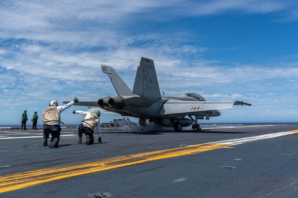 U.S. Navy sailors direct the launch of an F/A-18E Super Hornet aboard USS Theodore Roosevelt on Sept. 7, 2026. A new House report is questioning whether the Navy has adequately studied the potential long-term neurological effects of naval aviation. (U.S.