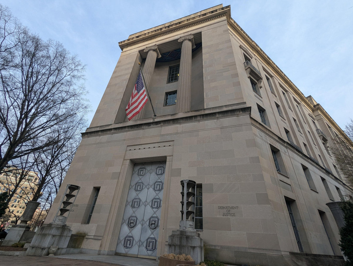 The Robert F. Kennedy Department of Justice Building in Washington, D.C. The DOJ announced charges against 28 noncitizens in California for alleged election-related offenses, with 11 arrests made on October 19, 2026. (Photo: Sdkb / Wikimedia Commons, CC
