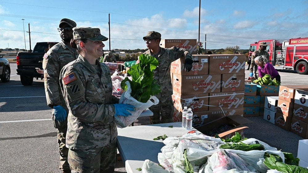 U.S. Army soldiers prepare fresh groceries for military families during a food distribution event at Fort Hood, Texas, on November 13, 2025. A new investigation published October 20, 2026, documents active-duty soldiers relying on food assistance as