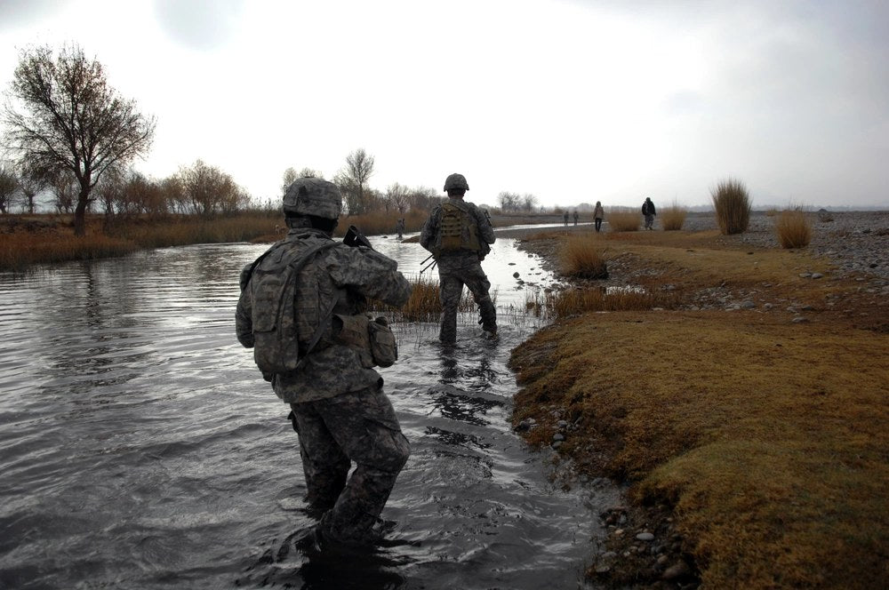 American soldiers, including members of the 82nd Airborne Division's 2nd Battalion, 508th Parachute Infantry Regiment, patrol Afghanistan's Arghandab River Valley in December 2009. Newly disclosed Army records describe an unrelated 2010 shooting