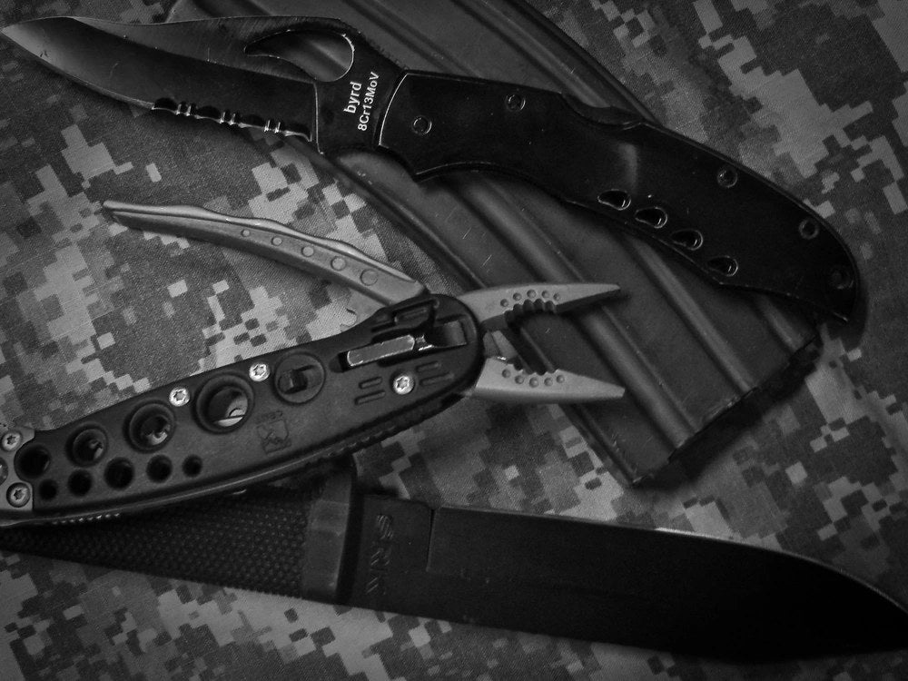 Illustrative file photo. Fixed blade and folding knives are shown together in a military field kit. Knife Rights, the Association of New Jersey Rifle & Pistol Clubs and four residents filed a federal lawsuit Sept. 21 challenging New Jersey restrictions