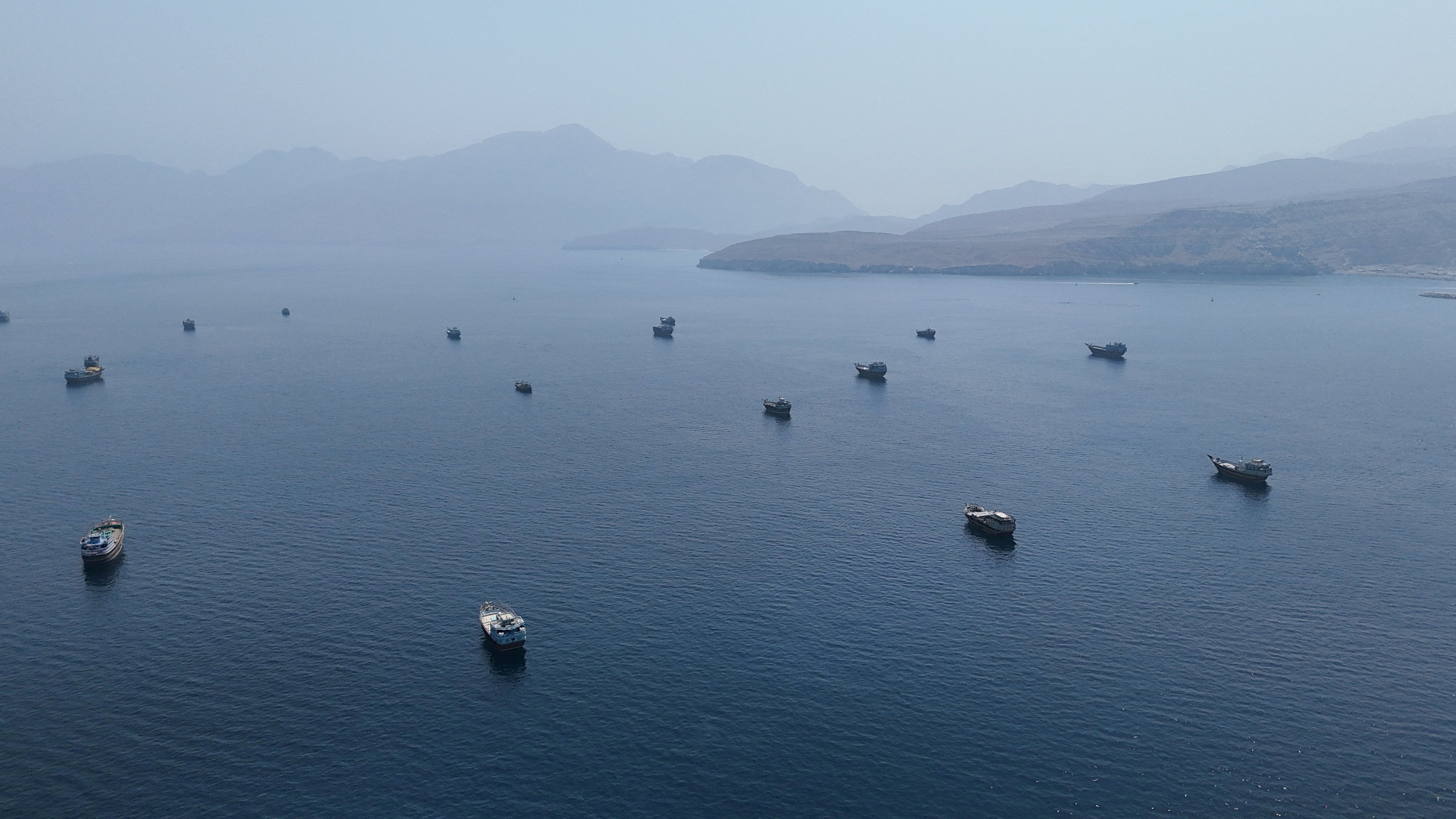 FILE PHOTO: A drone view shows vessels near the Strait of Hormuz, as seen from Musandam, Oman, August 28, 2026. REUTERS/Stringer/File Photo
