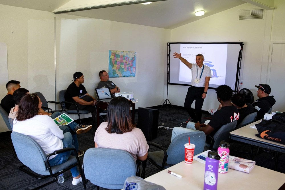 Illustrative file photo. USS Abraham Lincoln sailors participate in Applied Suicide Intervention Skills Training in San Diego on Sept. 19, 2023. New reporting from current and former Navy personnel describes sailors aboard deployed carriers waiting weeks