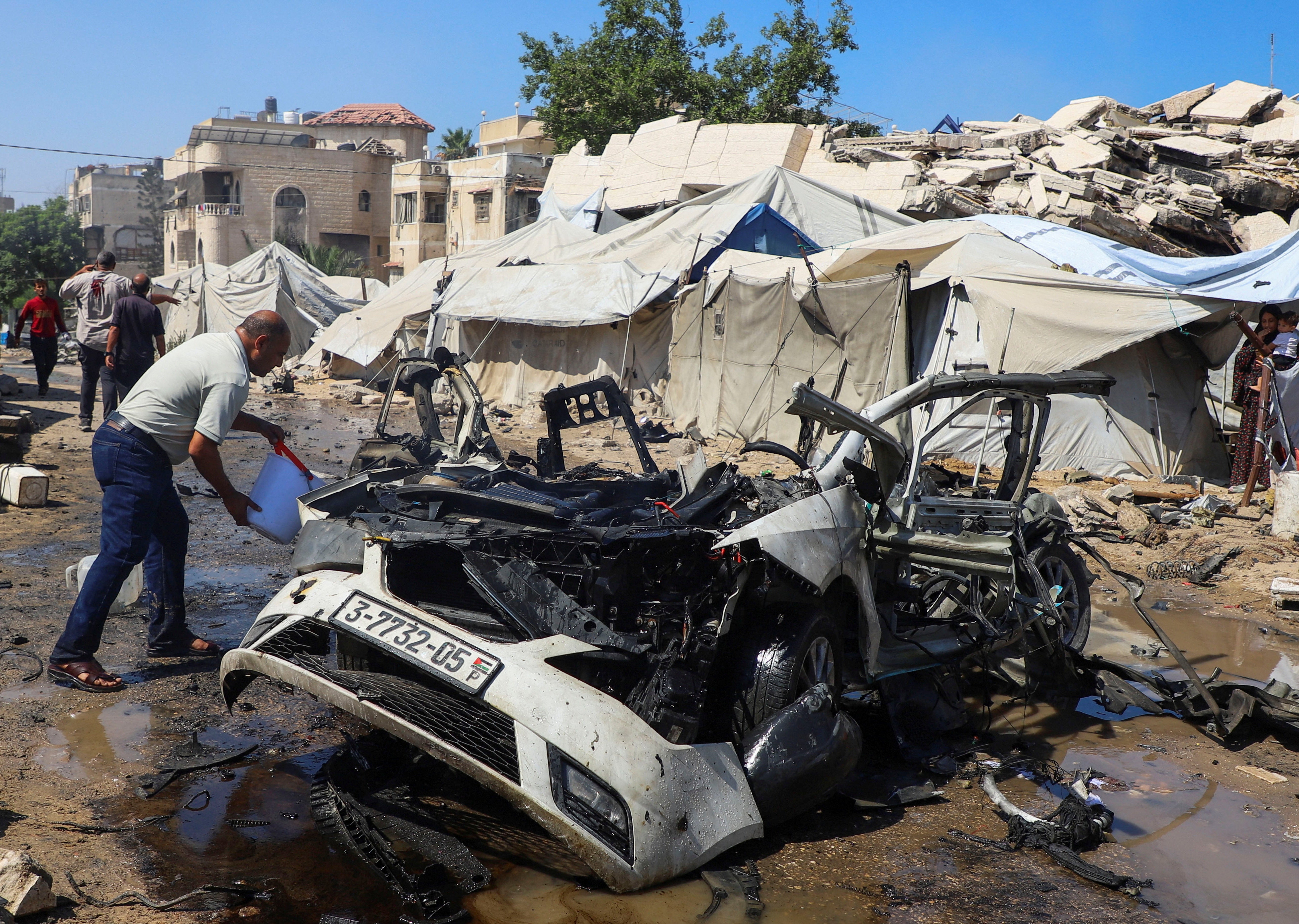 Palestinians gather at the site of Israeli strikes and gunfire in Gaza City, September 1, 2026. REUTERS/Ebrahim Hajjaj