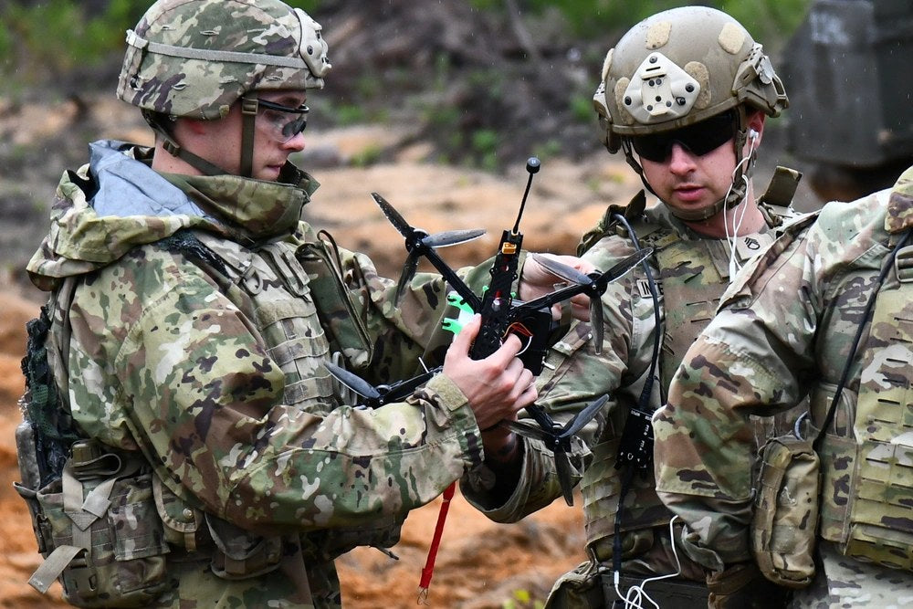 U.S. Army soldiers assigned to the 173rd Airborne Brigade conduct first-person-view drone training during Swift Response 2025 at Pabradė Training Area, Lithuania, May 18, 2025. The brigade tested purpose-built FPV drones against autonomous moving