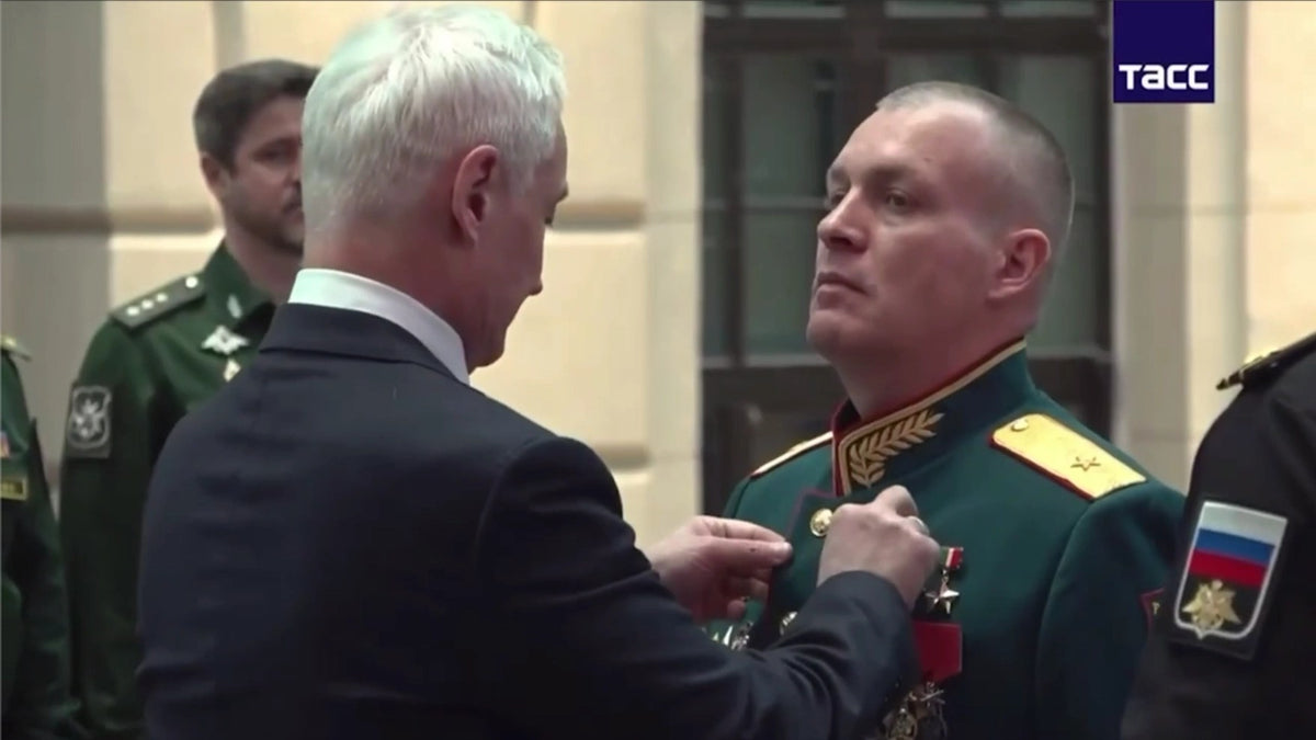 Russian Defense Minister Andrei Belousov presents Maj. Gen. Anton Grunis with the Gold Star of the Hero of Russia during an August 2026 ceremony. Grunis’ death was confirmed weeks later. Screenshot from Russian Defense Ministry footage.
