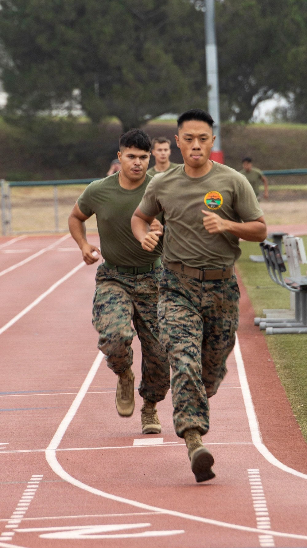 U.S. Marines run during the Warrior Athlete Readiness and Resilience Challenge at Camp Pendleton, California, Sept. 23, 2026. Marine Corps Inspector General inspections can examine whether units are properly implementing fitness and body-composition