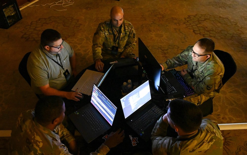U.S. Army soldiers and a Defense Department contractor assigned to the Regional Cyber Center-Southwest Asia participate in the Best Cyber Warrior Competition in Kuwait City, Oct. 29, 2024. A new Pentagon cyber incentive system that took effect Oct. 1,