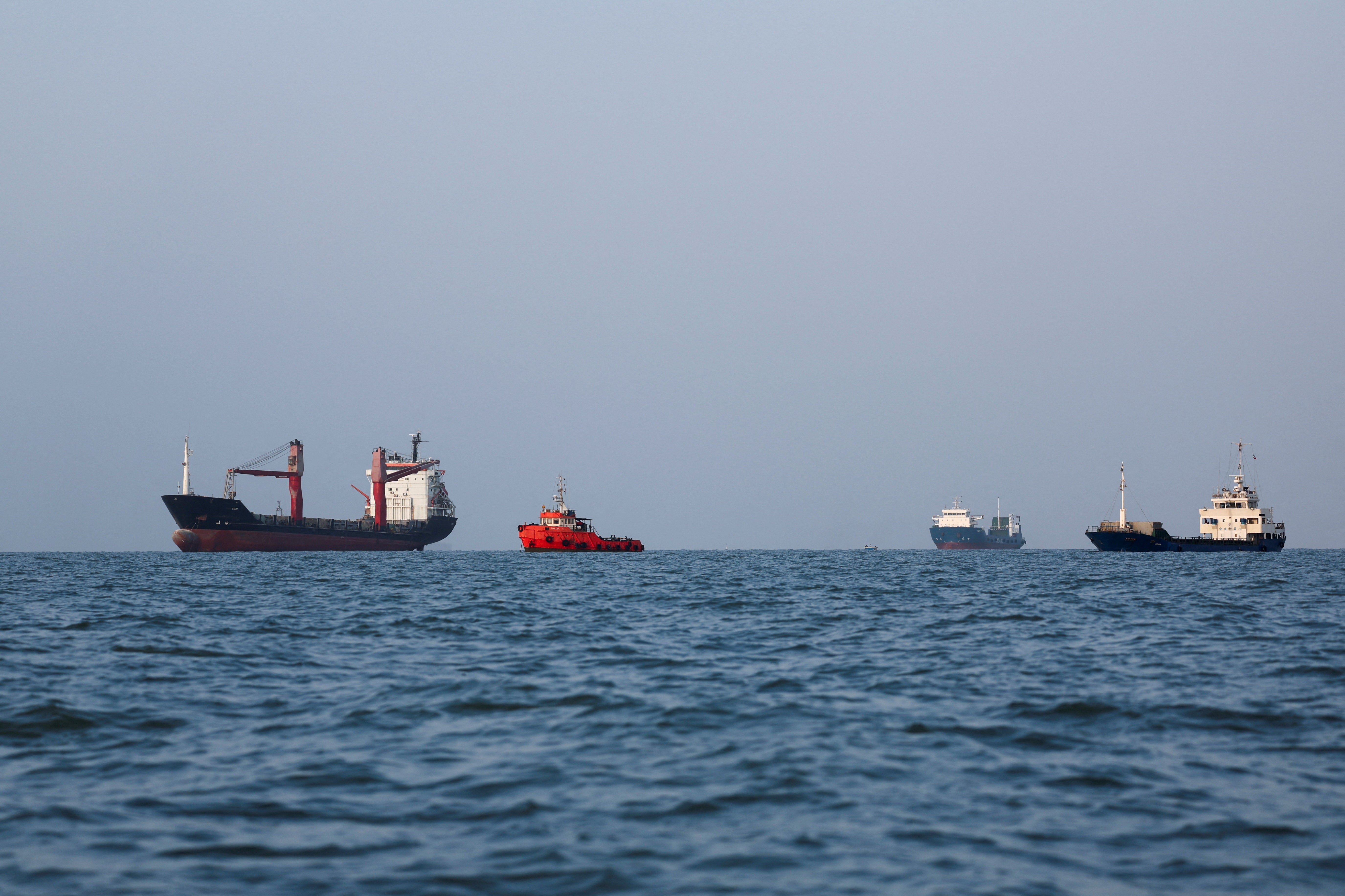 Vessels in the Strait of Hormuz are visible near the beach of Bandar Abbas, Iran, August 27, 2026. Majid Asgaripour/WANA (West Asia News Agency) via REUTERS