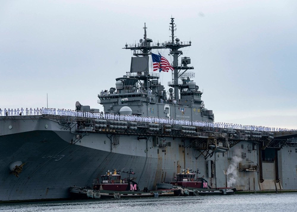 USS Kearsarge returns to Naval Station Norfolk following a deployment in October 2022. Roughly 90 sailors assigned to the ship recently returned from approximately 10 days underway to discover their vehicles had been towed from a base parking area ahead