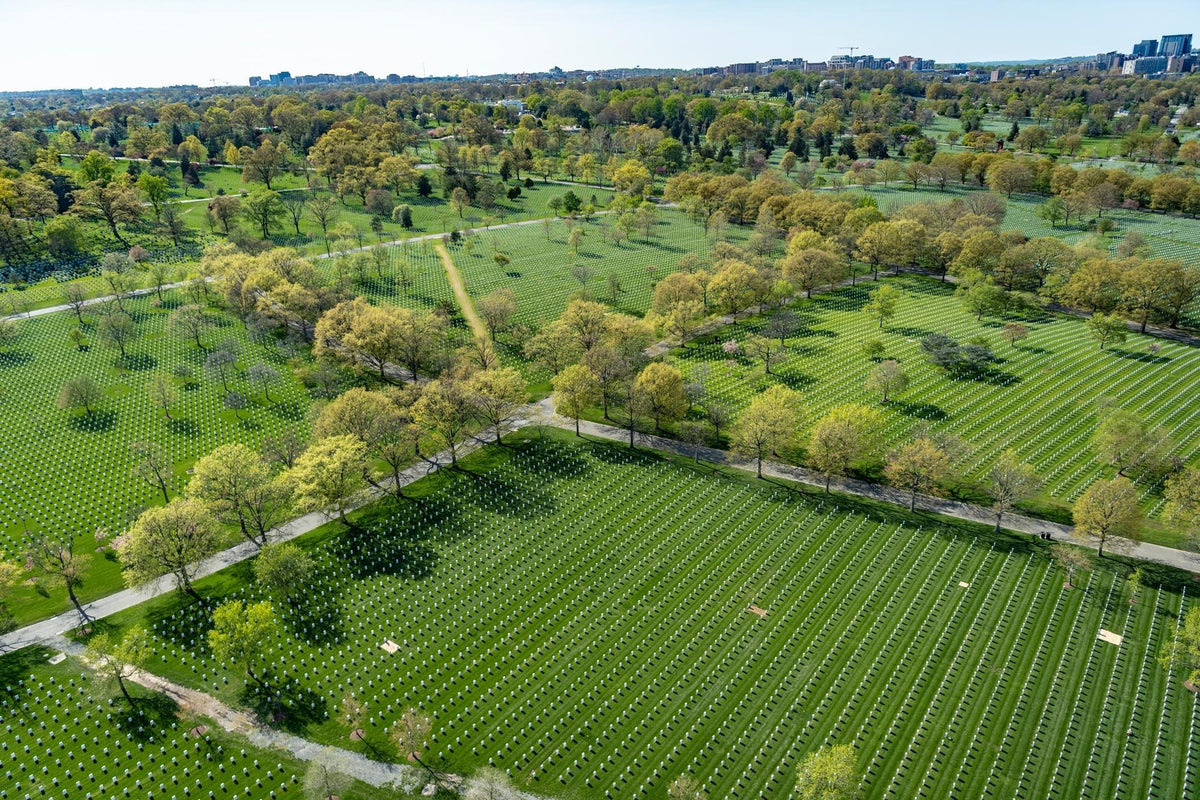An aerial view of Section 68 at Arlington National Cemetery in Virginia on April 20, 2022. A new Washington Post computer analysis projects that President Trump's proposed 250-foot triumphal arch could cast shadows across more than 75,000 Arlington