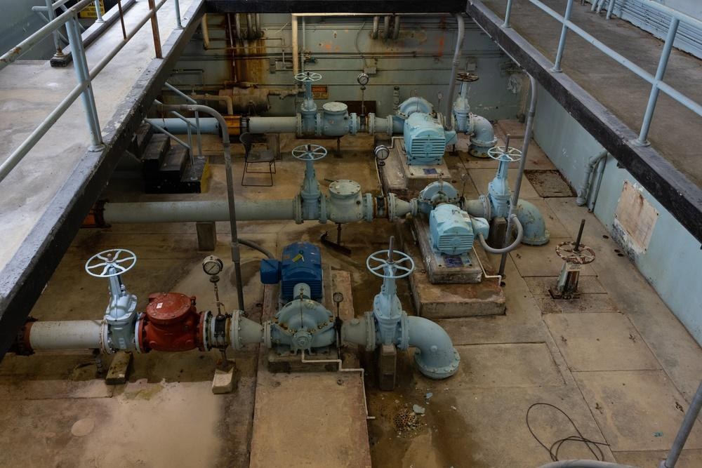 Pipes and pumping equipment at the Hadnot Point Water Treatment Facility aboard Marine Corps Base Camp Lejeune, North Carolina, in April 2024. The first trial under the 2022 Camp Lejeune Justice Act was scheduled to begin October 26, 2026, as thousands