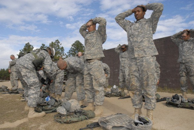 Soldiers with Company C, 2nd Battalion, 13th Infantry Regiment take part in Victory Forge at Fort Jackson, South Carolina, in December 2007. (U.S. Army)