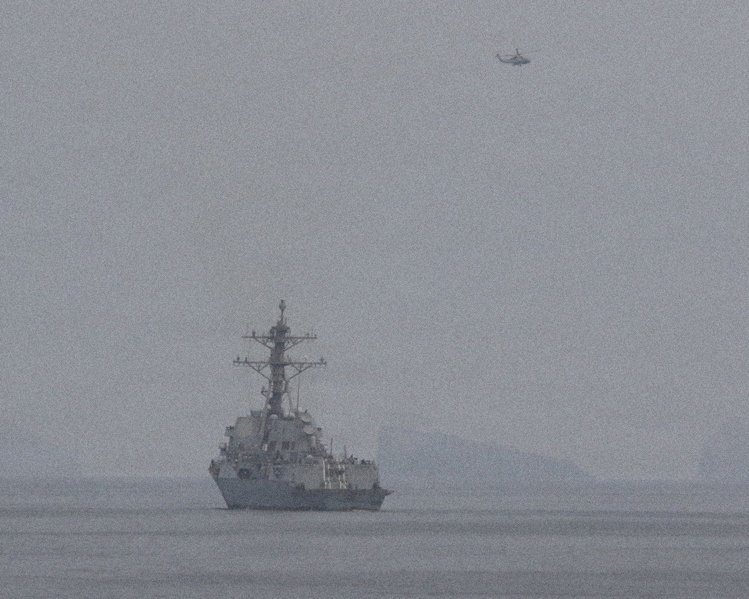 US destroys six Iranian boats, downs missiles and drones, admiral says