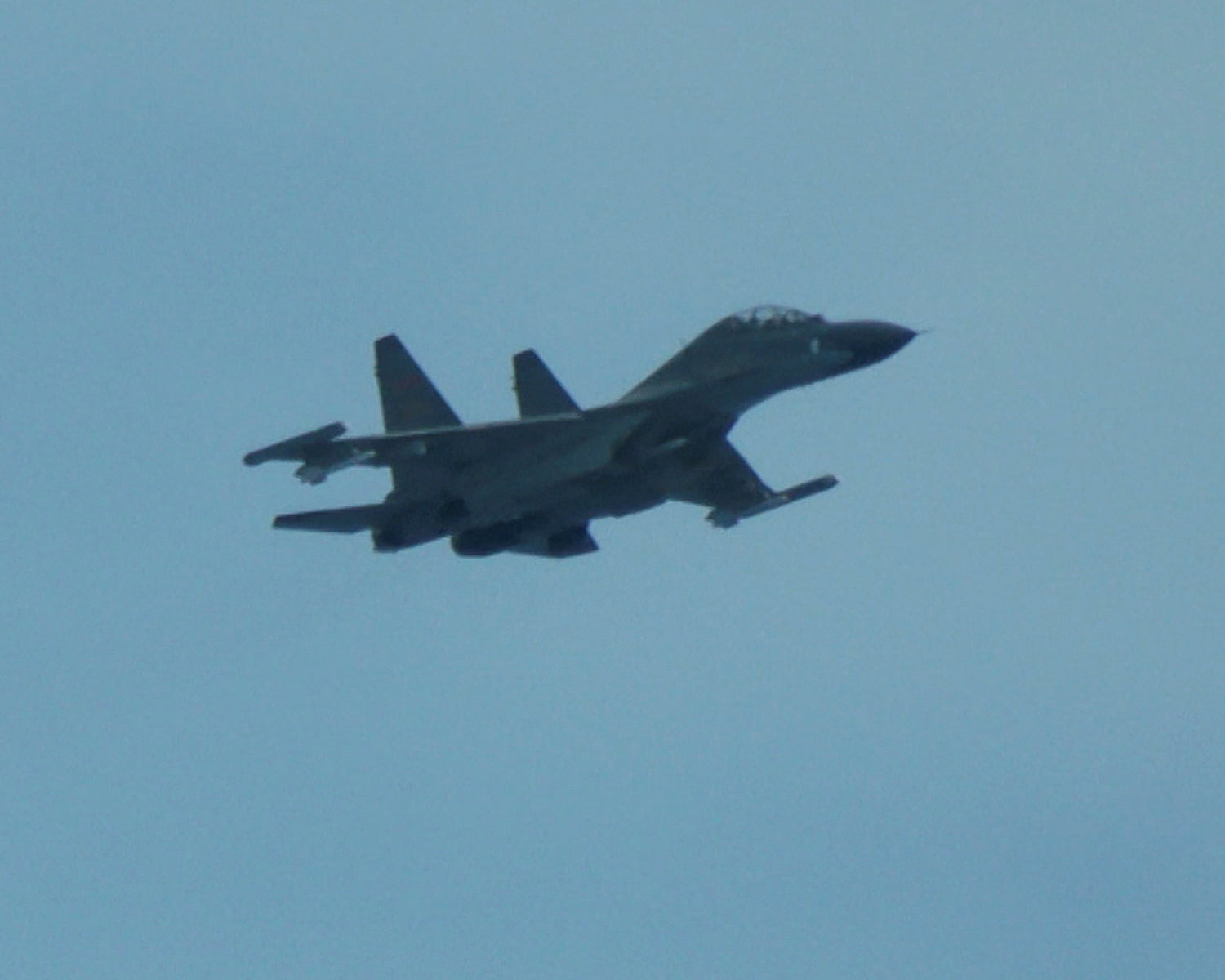 Chinese fighter “intercepts” Philippine plane over disputed shoal, Manila says