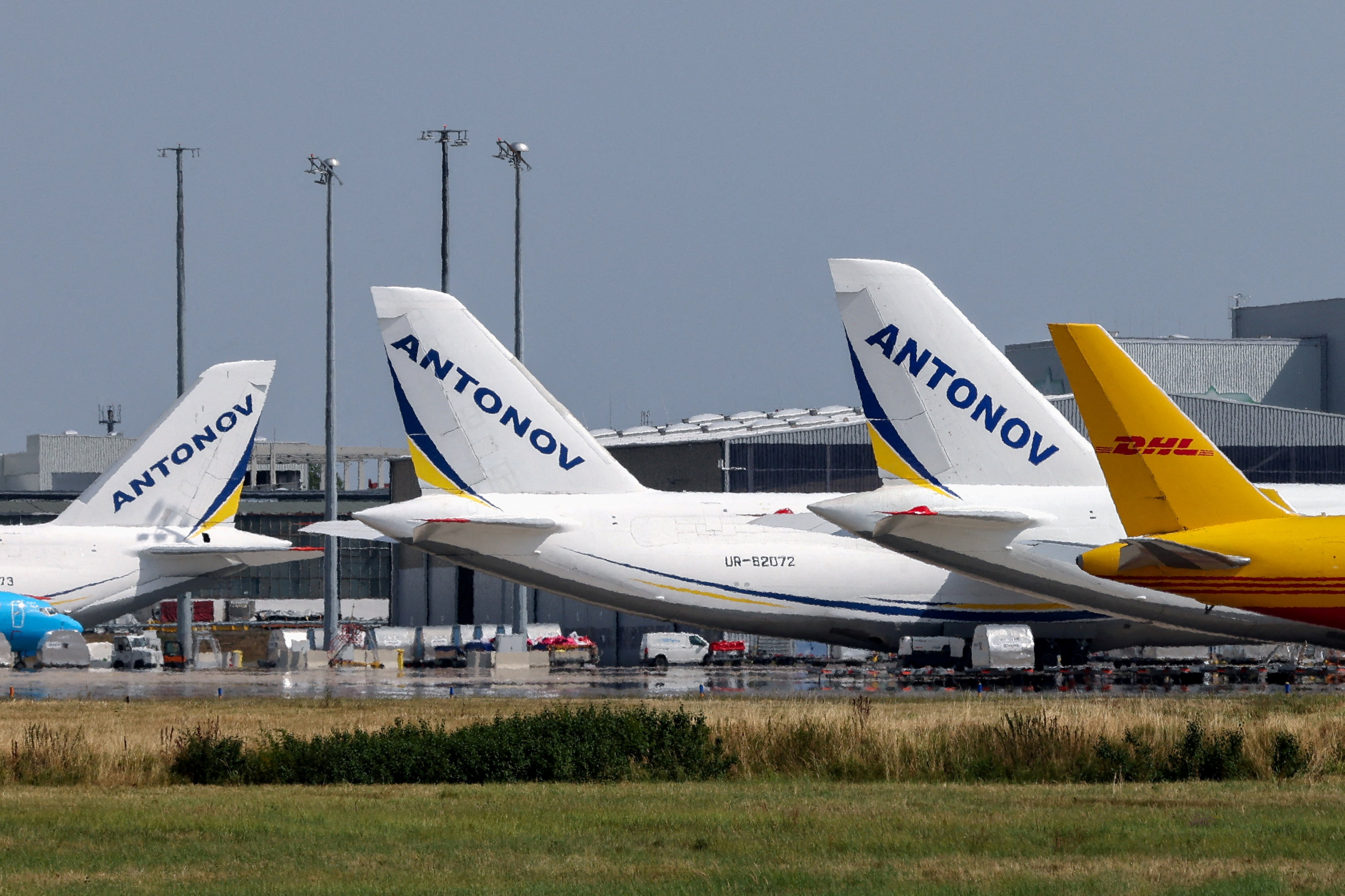 FILE PHOTO: The empennages of a DHL cargo plane and Ukrainian Antonov cargo planes at Leipzig/Halle Airport in Schkeuditz, Germany, August 5, 2026, after the police said explosives experts examined a drone found near a runway, and after a DHL cargo