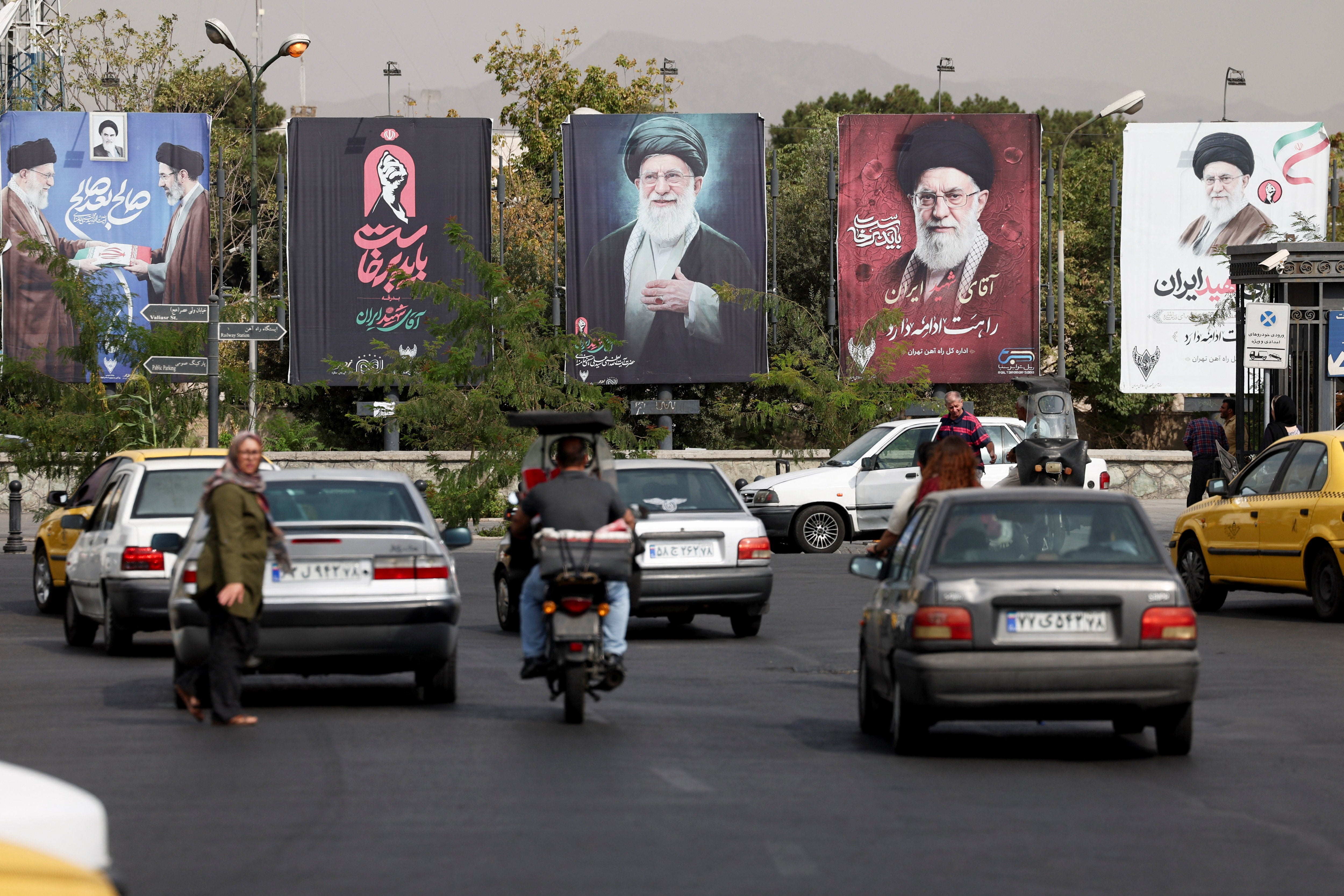 Banners with pictures of the late Supreme Leader of Iran, Ayatollah Ali Khamenei, are displayed on a street in Tehran, Iran, August 22, 2026. Majid Asgaripour/WANA (West Asia News Agency) via REUTERS