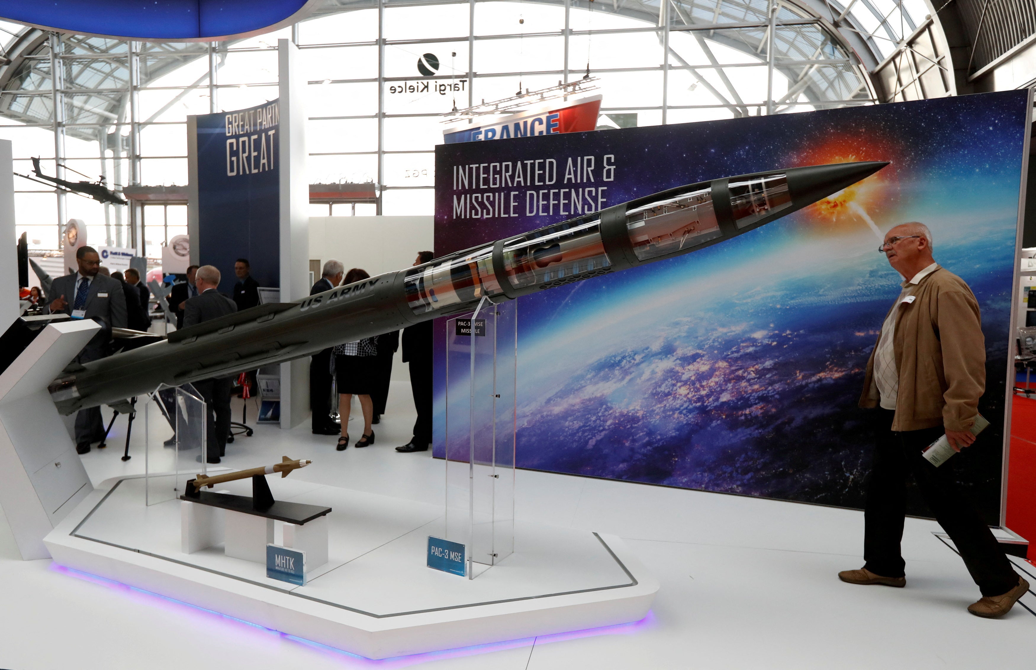 FILE PHOTO: A man looks at a Patriot Advanced Capability (PAC-3) Missile Segment Enhancement (MSE) model by Lockheed Martin at an international military fair in Kielce, Poland September 7, 2017. REUTERS/Kacper Pempel/File Photo