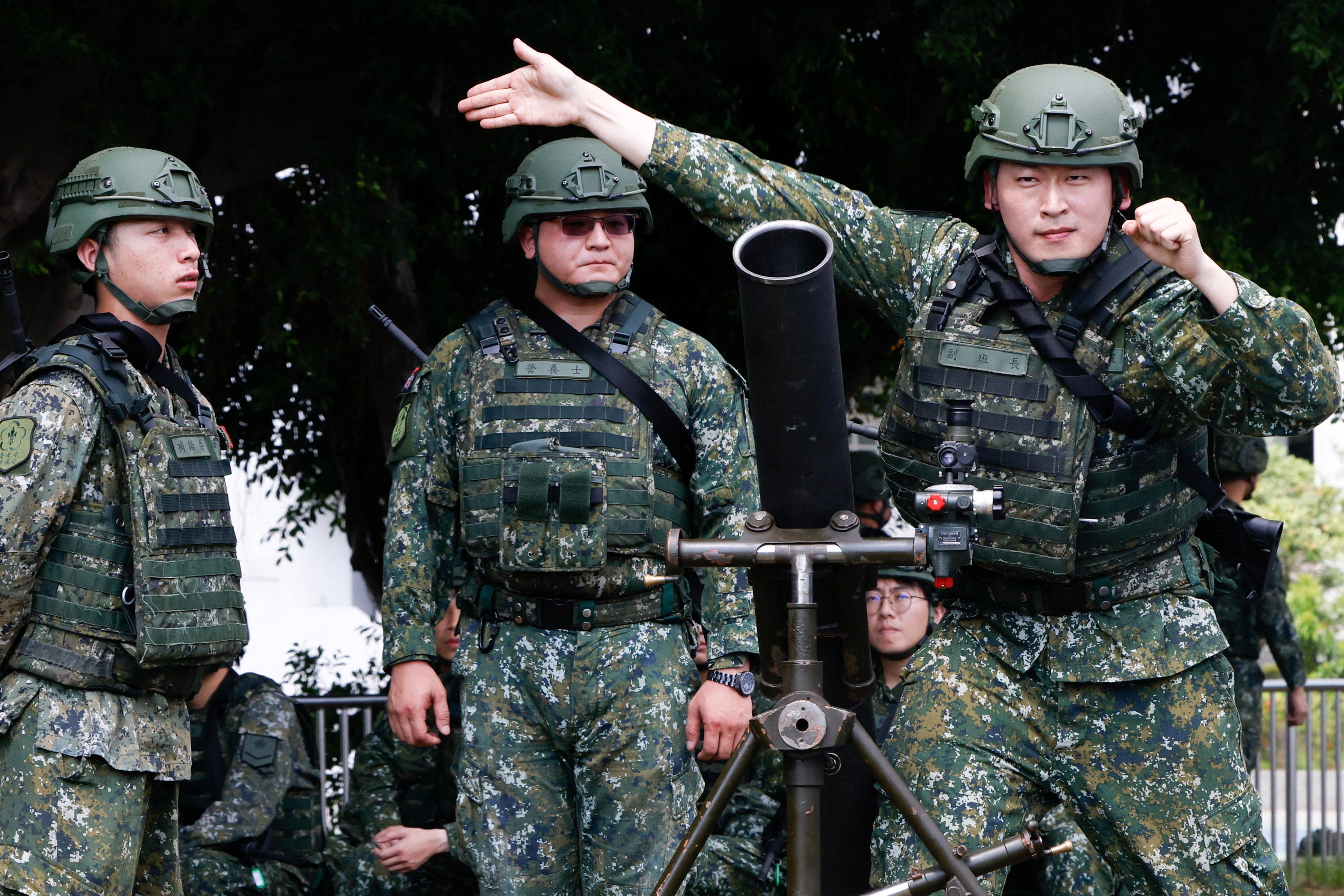 Taiwanese military reservists from a mortar battalion of the Taipei City Reserve Brigade take part in a training exercise in Taipei, Taiwan, August 5, 2026. REUTERS/Ann Wan