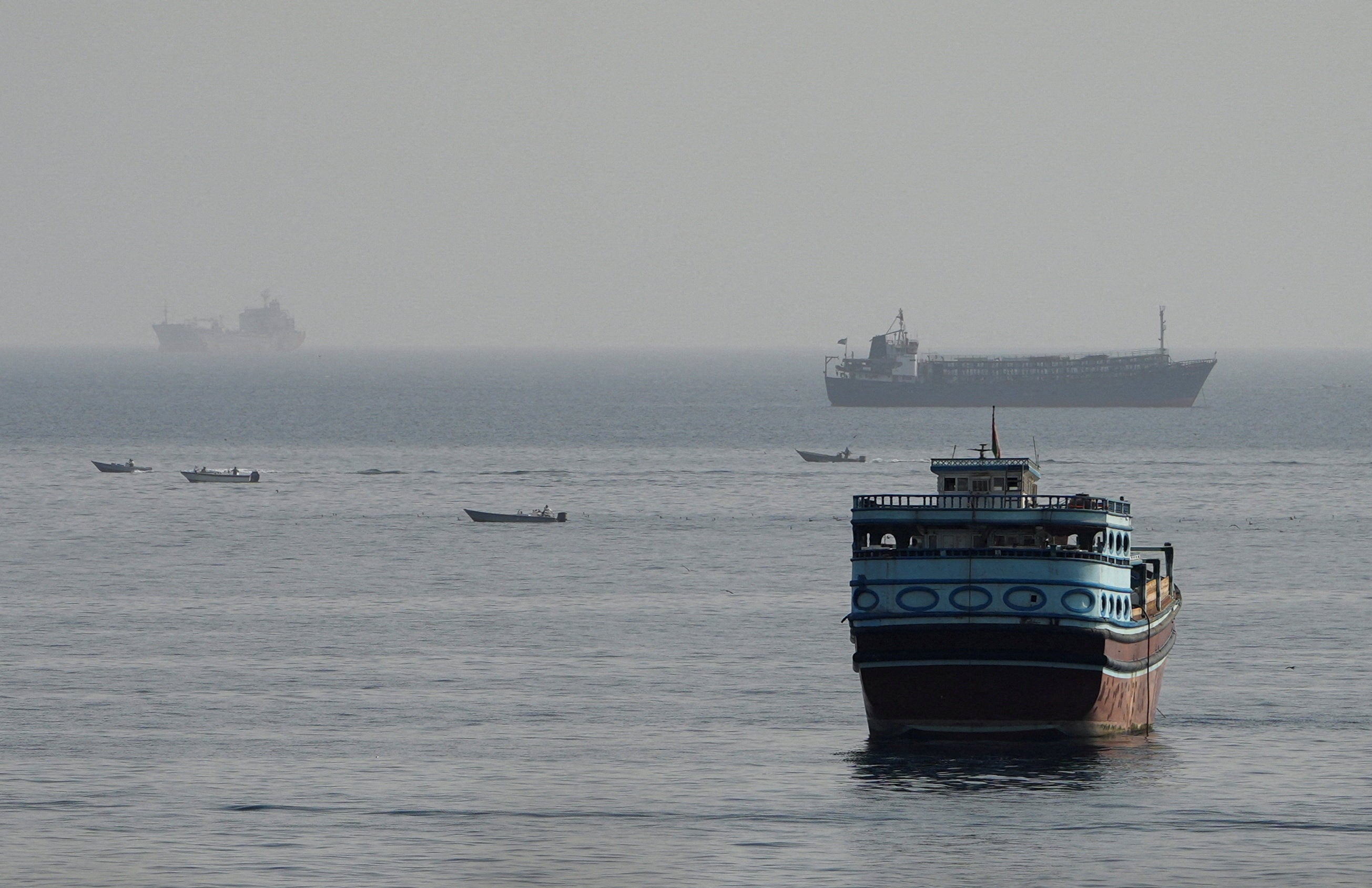 Vessels in the Strait of Hormuz, as seen from Musandam, Oman, August 3, 2026. REUTERS/Stringer
