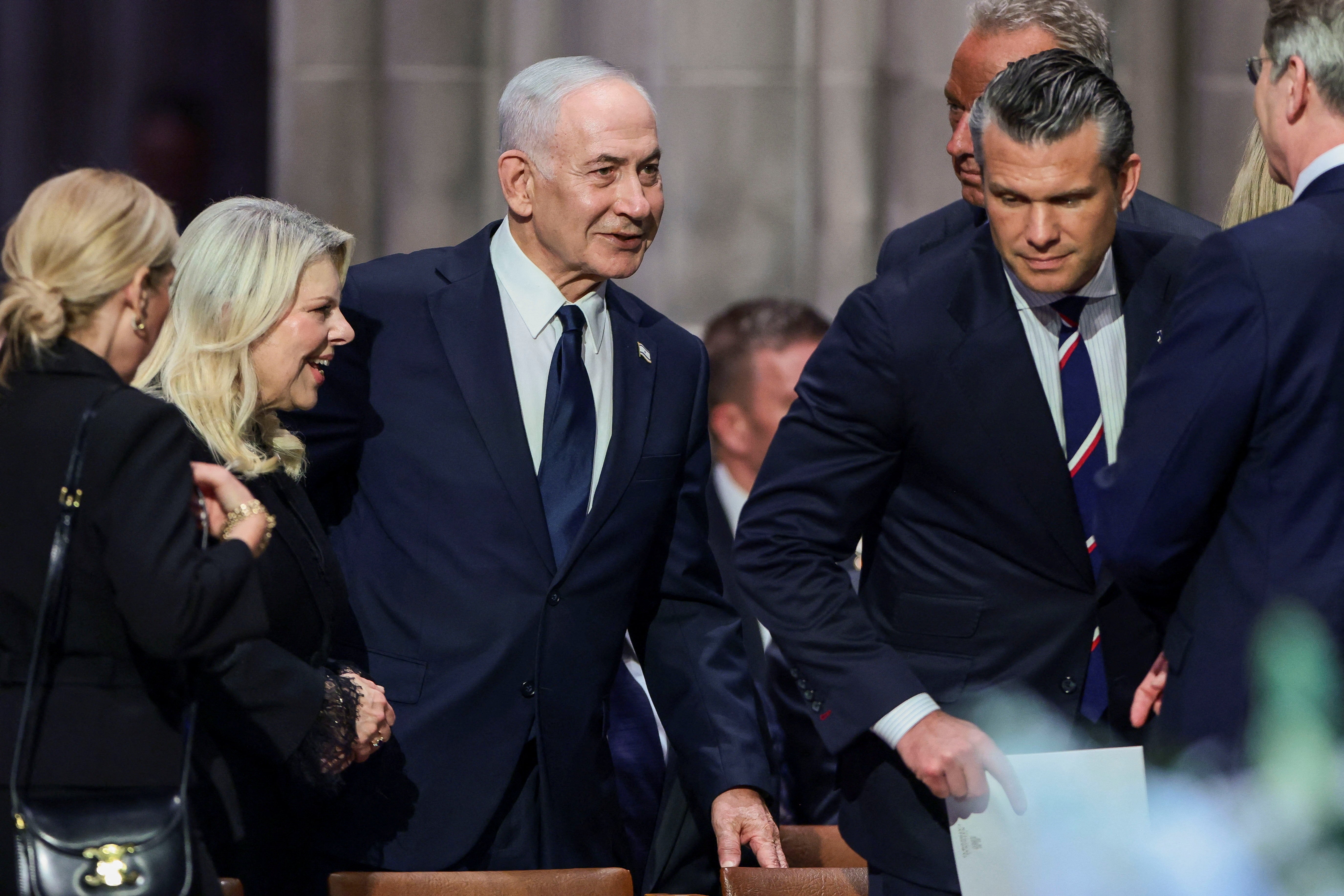 FILE PHOTO: Israeli Prime Minister Benjamin Netanyahu with his wife Sara, U.S. Defense Secretary Pete Hegseth and other officials on the day of the funeral service for late U.S. Senator Lindsey Graham (R-SC) at Washington National Cathedral in