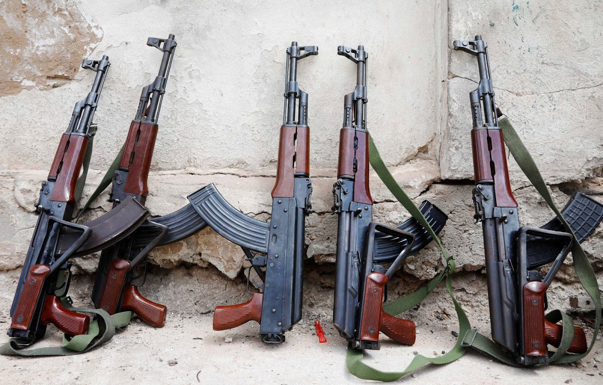 Weapons looted from a military training camp are displayed during a Reuters interview in Mogadishu, Somalia